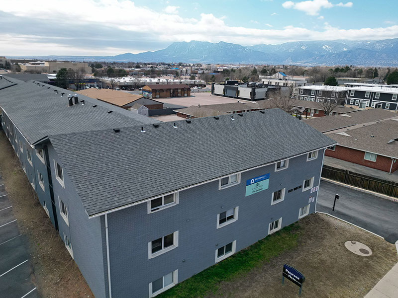 Aerial view of Penrose Plaza with mountains in background